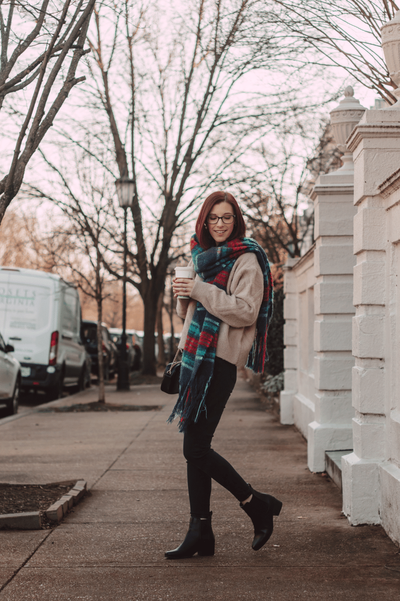 girl in city with plaid scarf winter outfit for cold